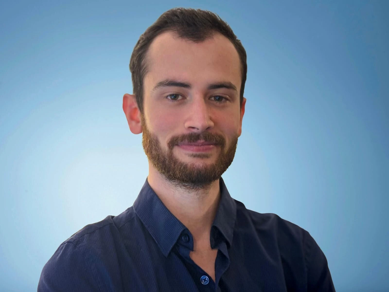 Senior Cyber Threat Intelligence Researcher Headshot